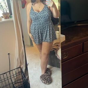 large Urban Outfitter Black Romper with White Flowers